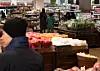 People shop at a large supermarket in Seoul on Dec. 30. [YONHAP]