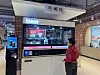 A visitor at Seoul Inclusive Digital Plaza in Gangdong District, eastern Seoul, waits for coffee made by a robotic arm on Dec. 18. [CHO JUNG-WOO]