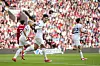 Tottenham's Son Heung-min, center, celebrates scoring his side's second goal during the match between Liverpool and Tottenham Hotspur at Anfield in Liverpool, England on Sunday. [AP/YONHAP]