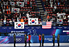 The correct version of Korea's national flag are raised during the medal ceremony for the women’s 1,500 meters short track speed skating medal ceremony at the 2026 Winter Olympics at Milano Ice Skating Arena in Italy on Feb. 20. [JOONGANGILBO]