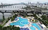 Visitors at the Ttukseom Hangang Park pool in Gwangjin District, eastern Seoul, enjoy the water on June 23, 2024. [YONHAP]