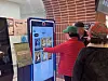 Visitors at Seoul Inclusive Digital Plaza in Gangdong District, eastern Seoul, select themes for photos in which they are transformed into different styles by artificial intelligence on Dec. 18. [CHO JUNG-WOO]