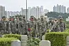 South Korean Navy and the Commander U.S. Naval Forces Korea personnel visit a burial site where Korean servicemen who served in the Korean Augmentation to the United States Army (Katusa) were laid to rest at UN Memorial Cemetery in Korea in Busan on June 24. [REPUBLIC OF KOREA NAVY]