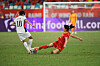 Korea's Ji So-yun, left, competes for the ball with Yao Wei of China during a AFC Women's Olympic Asian Qualifying Group B match at Xiamen Egret Stadium in Xiamen, China on Wednesday.  [XINHUA/YONHAP]