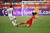 Korea's Ji So-yun, left, competes for the ball with Yao Wei of China during a AFC Women's Olympic Asian Qualifying Group B match at Xiamen Egret Stadium in Xiamen, China on Wednesday. [XINHUA/YONHAP]