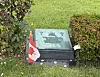 A white chrysanthemum flower planted next to the gravestone shows that a Canadian soldier died on June 24, 1953, in a photo taken at UN Memorial Cemetery in Korea in Busan on June 24. [LEE SOO-JUNG]