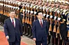 President Lee Jae Myung, right, and Chinese President Xi Jinping walk past the honor guard at the Great Hall of the People in Beijing on Jan. 5. [JOINT PRESS CORPS]