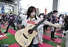 A contestant participates in a group strestching session ahead of the Hangang Space-out Competition at Jamsu Bridge in Seocho District, southern Seoul, on May 11. [PARK SANG-MOON]