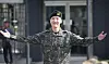 BTS's J-Hope greets reporters and fans after finishing his mandatory military duty on Oct. 17 at his base camp in Wonju, Gangwon. [NEWS1]