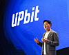 Dunamu CEO Oh Kyoung-suk gives a speech at the Upbit D Conference (UDC), held at the Grand InterContinental Seoul Parnas in Gangnam District, southern Seoul, on Tuesday. [DUNAMU]