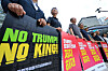 Activists hold a protest against the reciprocal tariffs of the Donald Trump administration in front of Post Tower in Jung District, central Seoul, on June 30. [NEWS1]