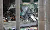 Firefighters try to rescue injured workers who were trapped under the rubble at the bridge construction site collapse in Anseong, Gyeonggi, on Feb. 25. [NEWS1]