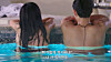 Show participants lounge in water in this still from the fifth season of Netflix dating show 'Single's Inferno,' set to release on Jan. 20. [NETFLIX]