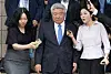 Korea Communications Commission (KCC) Chairman Kim Hong-il, center, is surrounded by reporters as he heads out of the building after his retirement ceremony at the Gwacheon Government Complex in Gyeonggi on Tuesday. President Yoon Suk Yeol accepted his resignation earlier in the day. [NEWS1]