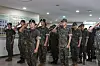 Soldiers from the Korea Armed Forces Athletic Corps (Kafac), including 17 players from K League 1 team Gimcheon Sangmu, salute during a discharge ceremony at the Kafac headquarters in Mungyeong, North Gyeongsang on July 15. [GIMCHEON SANGMU]