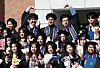 Students pose for photos during a graduation ceremony for international students held at Keimyung University on Feb. 18. The university is one of the shortlisted institutions that plan to focus on globalization. [YONHAP]