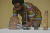 Benin bronzes looted in the past and returned to Nigeria are examined during a handing over ceremony in Lagos Nigeria, June 21. [AP/YONHAP]