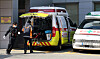 Paramedics handle a patient in front of an emergency room at a secondary hospital in Gwangju on Monday. [YONHAP]