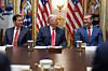 Defense Secretary Pete Hegseth, right, smiles as President Donald Trump, center, speaks during a cabinet meeting at the White House on Jan. 29 in Washington. At left is Secretary of State Marco Rubio. [AP/YONHAP]