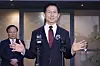 People Power Party (PPP) candidate Kim Moon-soo speaks to reporters in front of a restaurant in central Seoul on May 7. [YONHAP]