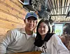 PGA golf player Kim Joo-hyung, left, poses with his wife. [JOONGANG ILBO]