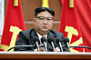 In this photo released by the North's Korean Central News Agency on Sunday, leader Kim Jong-un attends the plenary session of the ruling Workers' Party Central Committee on Saturday in Pyongyang. [NEWS1]