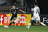Kim Tae-hwan, left, dribbles the ball during an AFC Champions League match between Ulsan Hyundai, now called Ulsan HD, and Kawasaki Frontale at Ulsan Munsu Football Stadium in Ulsan on Dec. 12, 2023. [NEWS1]
