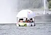 North Korean residents enjoy a ride along the Taedong River on a floating boat. [CHOSON SINBO/YONHAP]