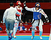 Korea's Park Hye-jin, right, celebrates after a victory over Lin Wei Chun of Chinese Taipei in the women’s -53kg final held at Lin'an Sports Culture Convention & Exhibition Center Gymnasium in Hangzhou, China on Tuesday. [YONHAP]