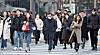 People in heavy winter clothing walk through Gwanghwamun Intersection in central Seoul on Nov. 26. [NEWS1]