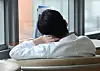 A doctor takes a rest at a hospital in Seoul on February, 2024. Medical chaos is anticipated in Korea as trainee doctors at five major hospitals were to submit their resignation letters by Monday to protest the government's decision to increase the enrollment quota at medical schools. [YONHAP]