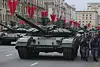 Russian police officers keep watch as military vehicles take part in a rehearsal for the annual military parade ahead of the Victory Day celebrations in downtown Moscow, Russia, on May 3, 2025. [EPA/YONHAP]