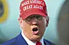 President Donald Trump speaks to reporters after landing at Palm Beach International Airport in West Palm Beach, on Feb. 16, after attending the NASCAR Daytona 500 auto race. [AP/YONHAP]
