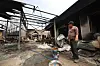 A man sees a destroyed garage in Uiseong County, North Gyeongsang, on March 27. His property was engulfed in a wildfire on March 26. [YONHAP]