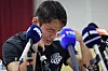 Suwon FC midfielder Son Jun-ho wipes away tears during a press conference at Suwon City Sports Council in Suwon, Gyeonggi on Sep. 11, 2024. [YONHAP]