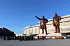 Pyongyang citizens and soldiers pay respect to former North Korea leaders Kim Il-sung and Kim Jong-il in front of their statues on Mansu Hill in Pyongyang on Jan. 1. [AP/YONHAP]