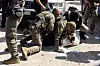 A man is detained as clashes break out after U.S. Customs and Border Protection officers attempted to raid a store in Bell, just south of Los Angeles, on June 20. [AFP/YONHAP]
