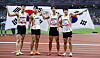 The Korean mens 4x100 meters relay team celebrate after finishing third in the sprint relay event at the HOC Stadium in Hangzhou, China on Tuesday.  [YONHAP]