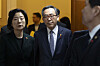 Foreign Minister Cho Tae-yul, center, leaves the main chamber after finishing a meeting with state council members held at the Seoul Government Complex in Jongno District, central Seoul on Dec. 8. [NEWS1]