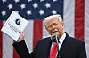 U.S. President Donald Trump holds the 2025 National Trade Estimate Report on Foreign Trade Barriers by the Office of the United States Trade Representative during an event to announce new tariffs at the White House in Washington on April 2. [AP/YONHAP]