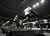 Participants run on indoor marathon treadmills during the “Speed Race 8.4” competition hosted by the Seoul Metropolitan Government at Jangchung Gymnasium in Seoul on June 29, 2024. [YONHAP]