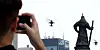 Military helicopters fly over downtown Seoul on Aug. 14 during a rehearsal for the upcoming Armed Forces Day parade on Oct. 1. [NEWS1]