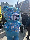 An anti-Yoon Suk Yeol protester dressed up as a blue bear walks through the crowd in central Seoul near Anguk Station on Apr. 4. [YOON SEUNG-JIN]