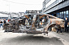 The burnt Mercedes EQE sedan is transferred for a thorough investigation in Incheon. [NEWS1]