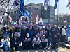 Anti-Yoon Suk Yeol protesters pose for a picture in central Seoul near Anguk Station on Apr. 4, after the Constitutional Court rules in favor of former President Yoon's impeachment. [YOON SEUNG-JIN]