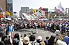 A man wearing traditional Korean clothing waves a flag in the middle of a anti-Yoon Suk Yeol protest near Anguk Station in central Seoul, on Apr. 4. [PARK SANG-MOON]