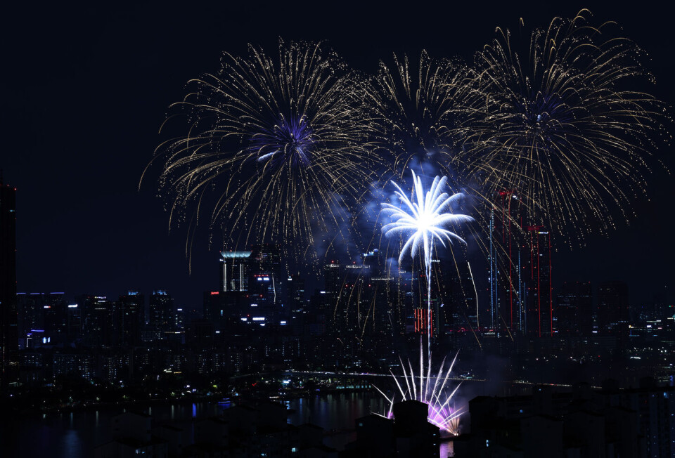 September Fireworks Fireworks light up city skyline with dramatic colors, demon hunters ...