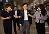 Industry Minister Kim Jung-kwan, center, is questioned by reporters upon arrival at Incheon International Airport on Sept. 14. [YONHAP]