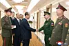 Pak Yong-il, deputy director of the Korean People's Army General Political Bureau, center, shakes hand with a Russian military official in this photo released by the North's state-run Korean Central News Agency on April 29. The KCNA reported that a KPA delegation led by Pak is attending the 3rd International Anti-Fascist Forum in Russia. [YONHAP]