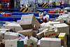 Parcels pile up at a logistics center in Seoul on Aug. 17, the final day of the courier industry’s designated delivery break. [YONHAP]